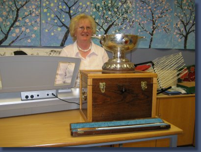 Elizabeth with the mixed choirs trophy and the baton